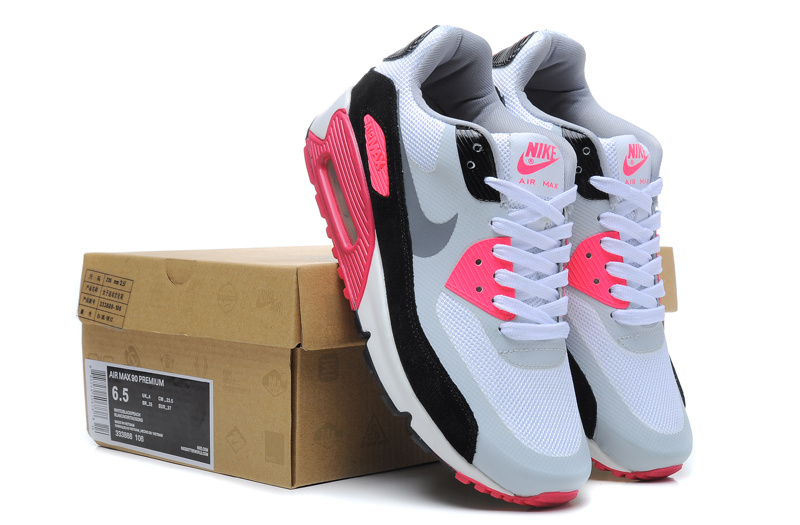pink white and black nike shoes